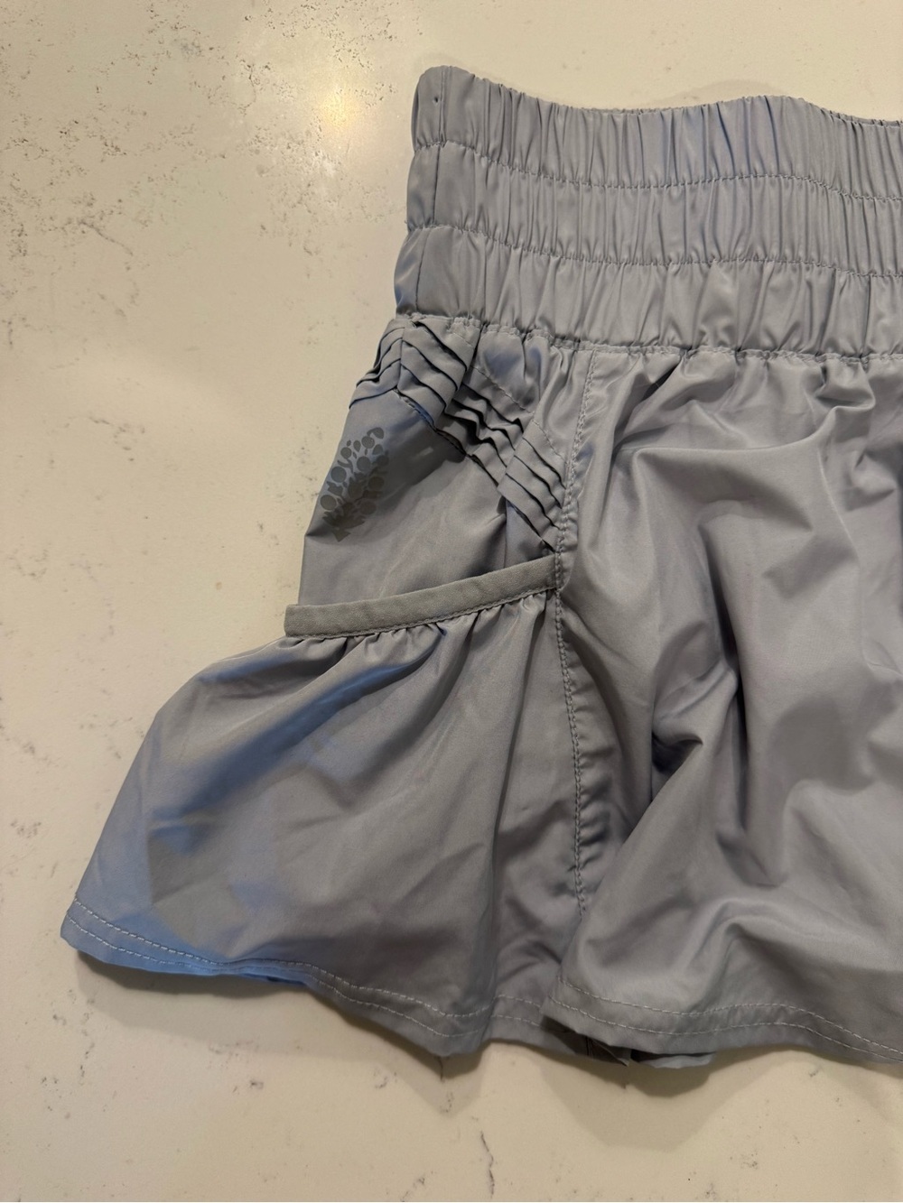 FP Movement Get Your Flirt On Ruffle Running Shorts Gray SP - Picture 4 of 8